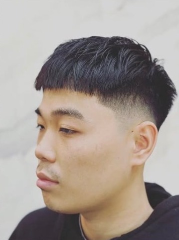 Blunt fringe with a low fade