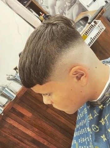 Side part with a skin fade