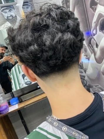 Curly top with a tight taper